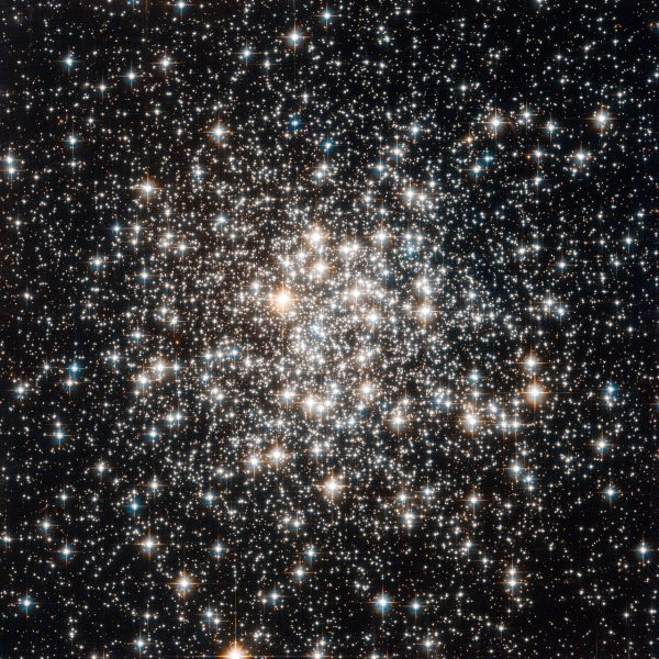 The NASA/ESA Hubble Space Telescope has captured a crowd of stars that looks rather like a stadium darkened before a show, lit only by the flashbulbs of the audience’s cameras. Yet the many stars of this object, known as Messier 107, are not a fleeting phenomenon, at least by human reckoning of time — these ancient stars have gleamed for many billions of years. Messier 107 is one of more than 150 globular star clusters found around the disc of the Milky Way galaxy. These spherical collections each contain hundreds of thousands of extremely old stars and are among the oldest objects in the Milky Way. The origin of globular clusters and their impact on galactic evolution remains somewhat unclear, so astronomers continue to study them through pictures such as this one obtained by Hubble. As globular clusters go, Messier 107 is not particularly dense. Visually comparing its appearance to other globular clusters, such as Messier 53 or Messier 54 reveals that the stars within Messier 107 are not packed as tightly, thereby making its members more distinct like individual fans in a stadium's stands. Messier 107 can be found in the constellation of Ophiuchus (The Serpent Bearer) and is located about 20 000 light-years from the Solar System. French astronomer Pierre Méchain first noted the object in 1782, and British astronomer William Herschel documented it independently a year later. A Canadian astronomer, Helen Sawyer Hogg, added Messier 107 to Charles Messier's famous astronomical catalogue in 1947. This picture was obtained with the Wide Field Camera of Hubble’s Advanced Camera for Surveys. The field of view is approximately 3.4 by 3.4 arcminutes.