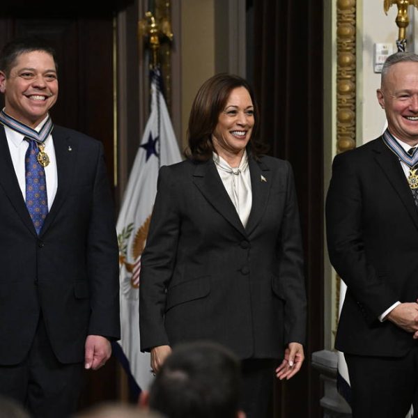 Former NASA astronauts Robert Behnken, left, and Douglas Hurley, right, and are seen after being awarded the Congressional Space Medal of Honor by Vice President Kamala Harris during a ceremony in the Indian Treaty Room of the Eisenhower Executive Office Building, Tuesday, Jan. 31, 2023 in Washington. Former astronauts Behnken and Hurley were awarded the Congressional Space Medal of Honor for their bravery in NASAÕs SpaceX Demonstration Mission-2 to the International Space Station in 2020, the first crewed flight as part of the agencyÕs Commercial Crew Program. Photo Credit: (NASA/Joel Kowsky)
